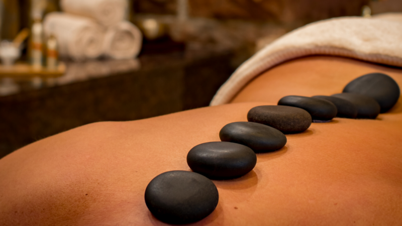 What Are the Wellness Perks of a Hot Rock Massage?